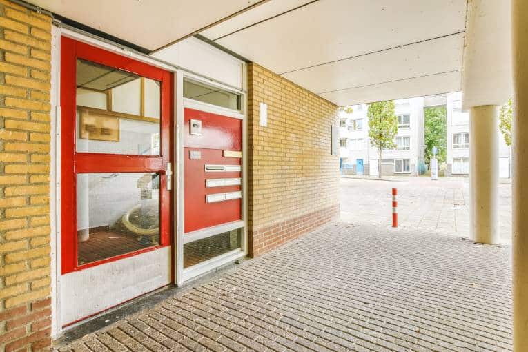 Cooke Brothers red door with kick plate